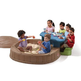 kinderen-spelen-in-de-zandbak-van-step2