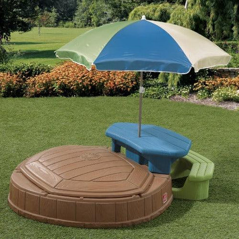 Image of step2-zandbak-met-picknicktafel-en-parasol